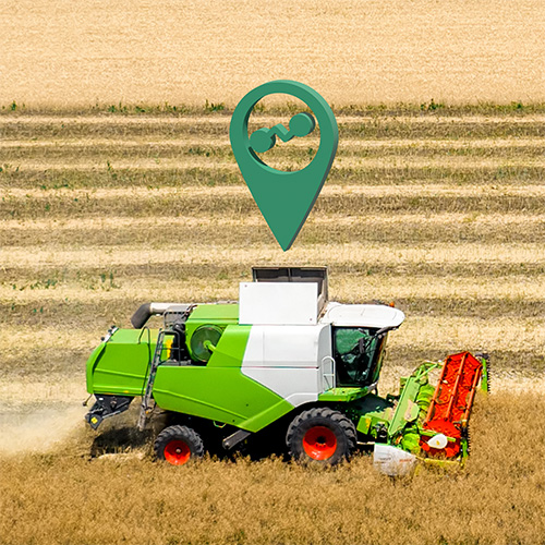 Combine harvester in the field with smart technology
